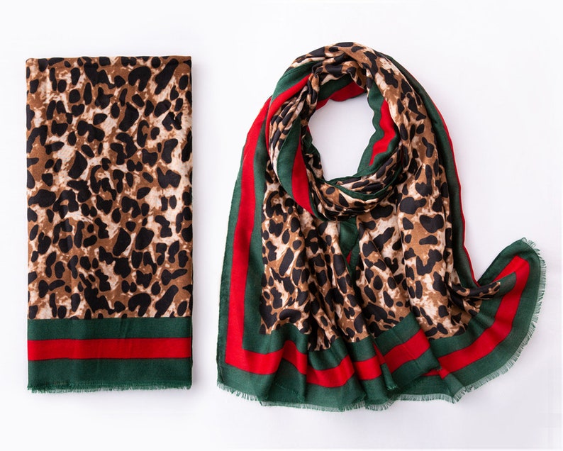 Leopard Print Scarf With  A Red And Green Trim